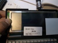 偏光板を表示と平行に置く